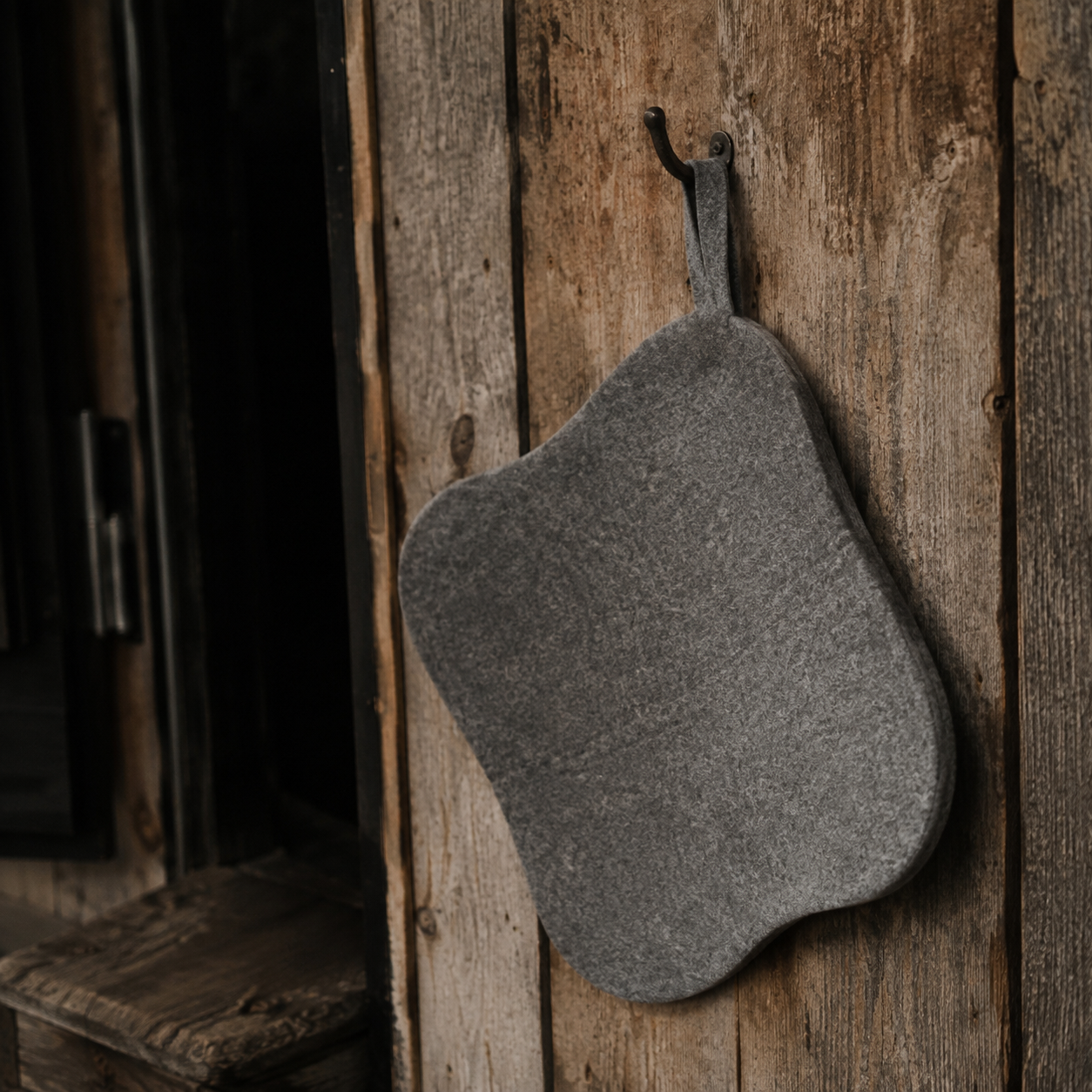 Halsa sauna seat cushion showing dense wool felt texture at 10mm thickness